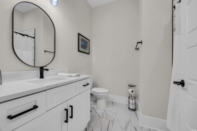 Discover unparalleled luxury at 1024 Pochard Dr, a truly on Wild Wing Plantation in South Carolina - for sale on GolfHomes.com, golf home, golf lot