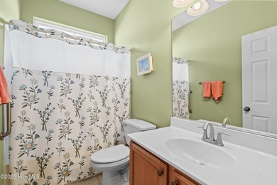 Experience the perfect blend of comfort and golf course living on Meadowlands Golf Club in North Carolina - for sale on GolfHomes.com, golf home, golf lot