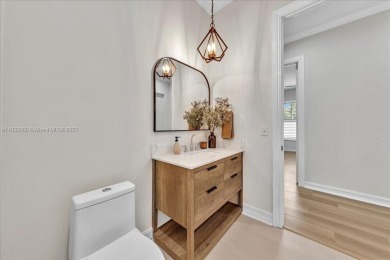 UPDATED AND MOVE-IN READY! This immaculate 4BD/3BA one-story on Heron Bay Golf Club in Florida - for sale on GolfHomes.com, golf home, golf lot
