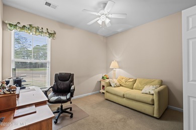 Experience the perfect blend of comfort and golf course living on Meadowlands Golf Club in North Carolina - for sale on GolfHomes.com, golf home, golf lot