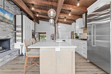 Take in sweeping views of the MN River Valley, Mpls skyline, and on Lost Spur Golf Course in Minnesota - for sale on GolfHomes.com, golf home, golf lot