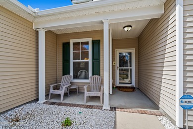 Experience the perfect blend of comfort and golf course living on Meadowlands Golf Club in North Carolina - for sale on GolfHomes.com, golf home, golf lot