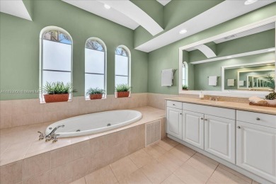 UPDATED AND MOVE-IN READY! This immaculate 4BD/3BA one-story on Heron Bay Golf Club in Florida - for sale on GolfHomes.com, golf home, golf lot