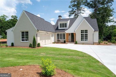 Welcome to this stunning custom-built residence nestled in the on Sunset Hills Country Club in Georgia - for sale on GolfHomes.com, golf home, golf lot