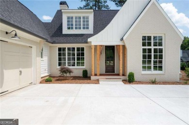 Welcome to this stunning custom-built residence nestled in the on Sunset Hills Country Club in Georgia - for sale on GolfHomes.com, golf home, golf lot