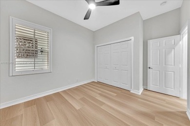 UPDATED AND MOVE-IN READY! This immaculate 4BD/3BA one-story on Heron Bay Golf Club in Florida - for sale on GolfHomes.com, golf home, golf lot