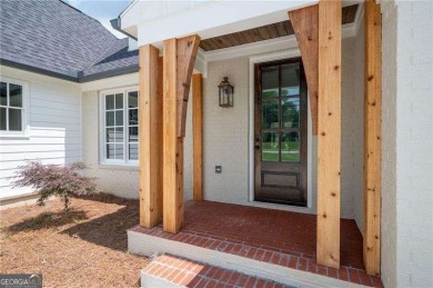 Welcome to this stunning custom-built residence nestled in the on Sunset Hills Country Club in Georgia - for sale on GolfHomes.com, golf home, golf lot