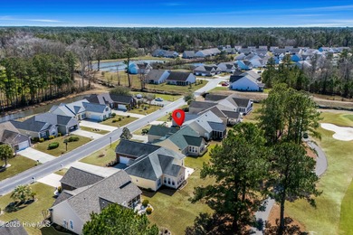 Experience the perfect blend of comfort and golf course living on Meadowlands Golf Club in North Carolina - for sale on GolfHomes.com, golf home, golf lot