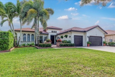 UPDATED AND MOVE-IN READY! This immaculate 4BD/3BA one-story on Heron Bay Golf Club in Florida - for sale on GolfHomes.com, golf home, golf lot