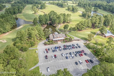 Experience the perfect blend of comfort and golf course living on Meadowlands Golf Club in North Carolina - for sale on GolfHomes.com, golf home, golf lot