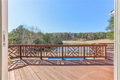 Experience luxury and convenience in this stunning lakefront on Canongate At Healy Point Country Club in Georgia - for sale on GolfHomes.com, golf home, golf lot