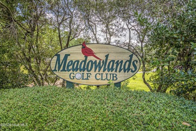 Experience the perfect blend of comfort and golf course living on Meadowlands Golf Club in North Carolina - for sale on GolfHomes.com, golf home, golf lot