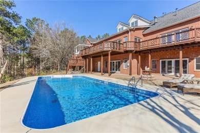 Experience luxury and convenience in this stunning lakefront on Canongate At Healy Point Country Club in Georgia - for sale on GolfHomes.com, golf home, golf lot