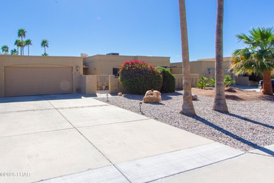 The spacious open floor plan allows you to enjoy the green on London Bridge Golf Course in Arizona - for sale on GolfHomes.com, golf home, golf lot