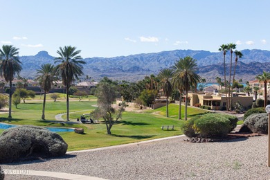The spacious open floor plan allows you to enjoy the green on London Bridge Golf Course in Arizona - for sale on GolfHomes.com, golf home, golf lot