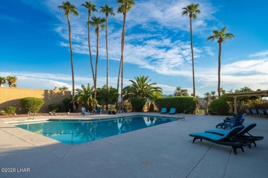 The spacious open floor plan allows you to enjoy the green on London Bridge Golf Course in Arizona - for sale on GolfHomes.com, golf home, golf lot