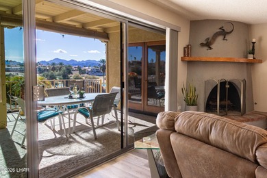 The spacious open floor plan allows you to enjoy the green on London Bridge Golf Course in Arizona - for sale on GolfHomes.com, golf home, golf lot