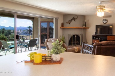 The spacious open floor plan allows you to enjoy the green on London Bridge Golf Course in Arizona - for sale on GolfHomes.com, golf home, golf lot