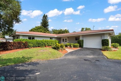 Exquisite home nestled in serene enclave of Plantation, right at on Plantation Preserve Golf Course in Florida - for sale on GolfHomes.com, golf home, golf lot