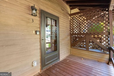 Welcome home to this charming two-story condo nestled in the on The Highlands Course at Lake Arrowhead in Georgia - for sale on GolfHomes.com, golf home, golf lot