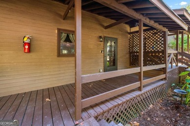 Welcome home to this charming two-story condo nestled in the on The Highlands Course at Lake Arrowhead in Georgia - for sale on GolfHomes.com, golf home, golf lot