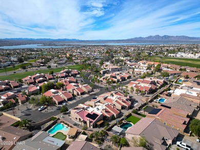Welcome to this beautifully maintained 2 bedroom, 2 bathroom, 2 on London Bridge Golf Course in Arizona - for sale on GolfHomes.com, golf home, golf lot