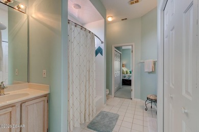 Beautifully turnkey furnished pool home located within the on Spruce Creek Golf Club in Florida - for sale on GolfHomes.com, golf home, golf lot