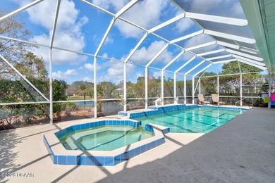 Beautifully turnkey furnished pool home located within the on Spruce Creek Golf Club in Florida - for sale on GolfHomes.com, golf home, golf lot