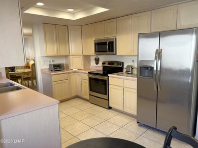 Welcome to this beautifully maintained 2 bedroom, 2 bathroom, 2 on London Bridge Golf Course in Arizona - for sale on GolfHomes.com, golf home, golf lot