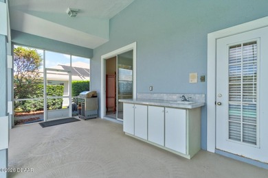 Beautifully turnkey furnished pool home located within the on Spruce Creek Golf Club in Florida - for sale on GolfHomes.com, golf home, golf lot