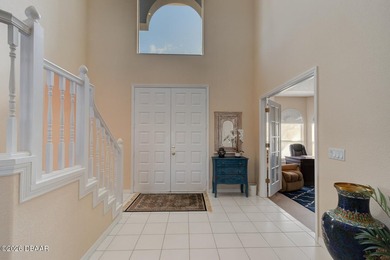 Beautifully turnkey furnished pool home located within the on Spruce Creek Golf Club in Florida - for sale on GolfHomes.com, golf home, golf lot