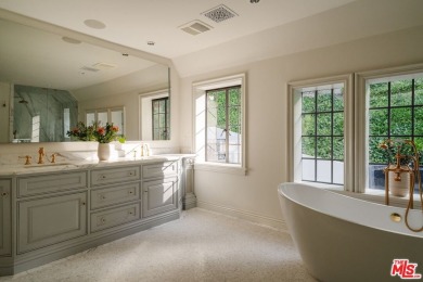 Experience unparalleled luxury at this magnificent English Manor on Bel-Air Country Club in California - for sale on GolfHomes.com, golf home, golf lot