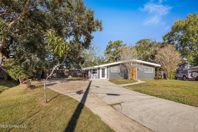 **Charming Mid-Century Modern Home in Ocean Springs**Welcome to on Gulf Hills Golf Club in Mississippi - for sale on GolfHomes.com, golf home, golf lot