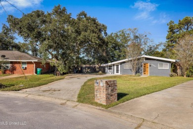 **Charming Mid-Century Modern Home in Ocean Springs**Welcome to on Gulf Hills Golf Club in Mississippi - for sale on GolfHomes.com, golf home, golf lot