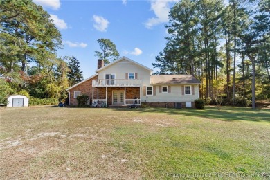 This large 4 bedroom home has a great layout and 3 full on Cypress Lakes Golf Course in North Carolina - for sale on GolfHomes.com, golf home, golf lot