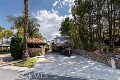 Honey Stop the Golf Cart!!! We have to check this property out on Rancho California RV Resort in California - for sale on GolfHomes.com, golf home, golf lot