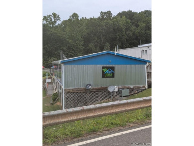 Wooded building lot in Poplar Creek Estates.  Easy walk/golf on Tanglewood Shores Golf Club in Virginia - for sale on GolfHomes.com, golf home, golf lot