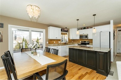 Spacious split-level home featuring 5 bedrooms and 2 bathrooms on Dodge Country Club in Minnesota - for sale on GolfHomes.com, golf home, golf lot