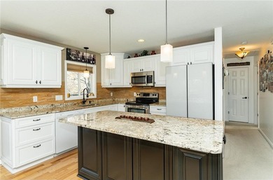 Spacious split-level home featuring 5 bedrooms and 2 bathrooms on Dodge Country Club in Minnesota - for sale on GolfHomes.com, golf home, golf lot