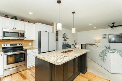 Spacious split-level home featuring 5 bedrooms and 2 bathrooms on Dodge Country Club in Minnesota - for sale on GolfHomes.com, golf home, golf lot