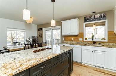 Spacious split-level home featuring 5 bedrooms and 2 bathrooms on Dodge Country Club in Minnesota - for sale on GolfHomes.com, golf home, golf lot