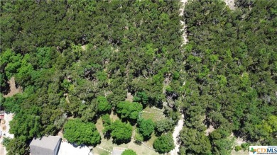 Discover serenity and seclusion in this picturesque flag lot on Canyon Lake Golf Club in Texas - for sale on GolfHomes.com, golf home, golf lot
