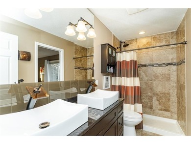 Spacious split-level home featuring 5 bedrooms and 2 bathrooms on Dodge Country Club in Minnesota - for sale on GolfHomes.com, golf home, golf lot