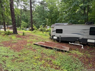 Check out this cleared lot ready for your camper! The current on River Ridge Golf Club in Virginia - for sale on GolfHomes.com, golf home, golf lot
