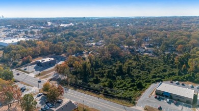 Nice land just off busy intersection with commercial potential on The Greens At North Hills Country Club in Arkansas - for sale on GolfHomes.com, golf home, golf lot