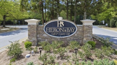 Welcome to your dream home in the prestigious Heron Bay on Canongate At Heron Bay in Georgia - for sale on GolfHomes.com, golf home, golf lot