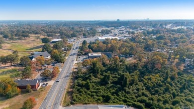Nice land just off busy intersection with commercial potential on The Greens At North Hills Country Club in Arkansas - for sale on GolfHomes.com, golf home, golf lot