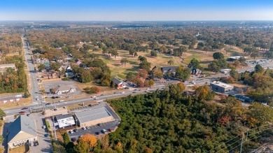 Nice land just off busy intersection with commercial potential on The Greens At North Hills Country Club in Arkansas - for sale on GolfHomes.com, golf home, golf lot
