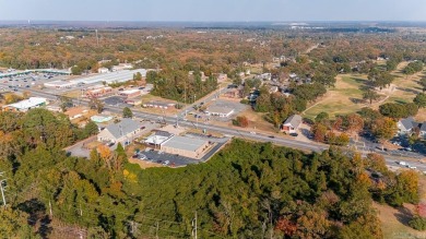 Nice land just off busy intersection with commercial potential on The Greens At North Hills Country Club in Arkansas - for sale on GolfHomes.com, golf home, golf lot
