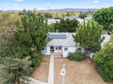 Charming single-story residence in quaint upscale neighborhood on Van Nuys Golf Course in California - for sale on GolfHomes.com, golf home, golf lot